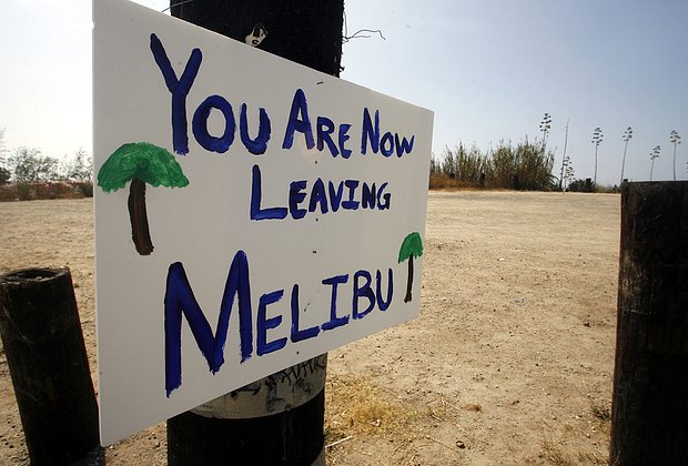 A sign is shown posted along the Pacific Coast Highway on the outskirts of Malibu, California August 2, 2006 stating 