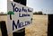 A sign is shown posted along the Pacific Coast Highway on the outskirts of Malibu, California August 2, 2006 stating 