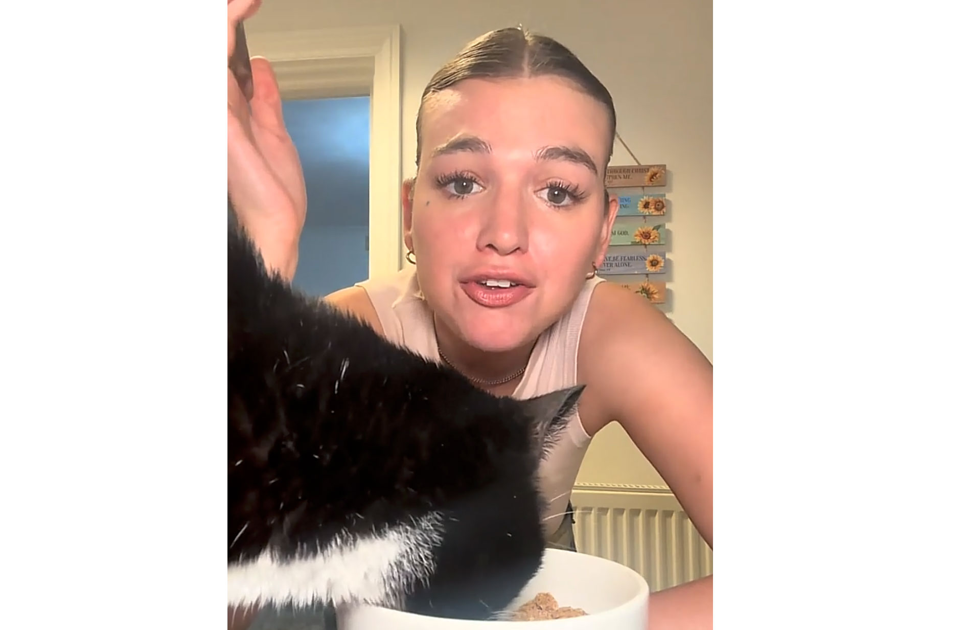 Sasha Jones eats cereal with cat from same bowl on TikTok
